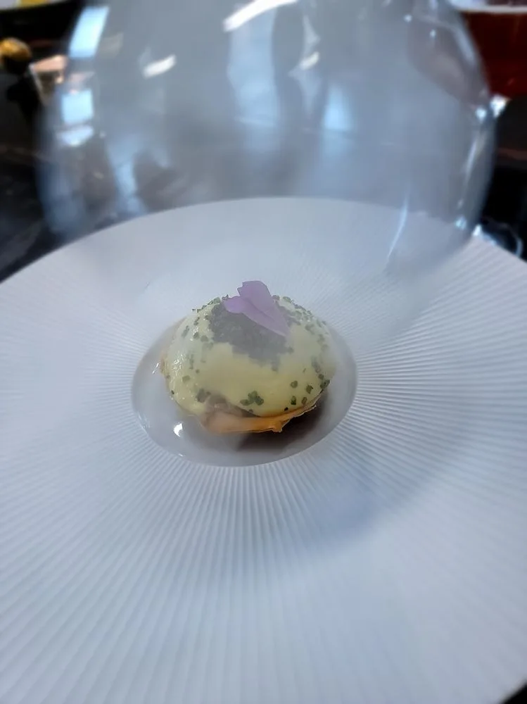 Signature sturgeon and sauerkraut tart dish at Gabriel Kreuther, New York