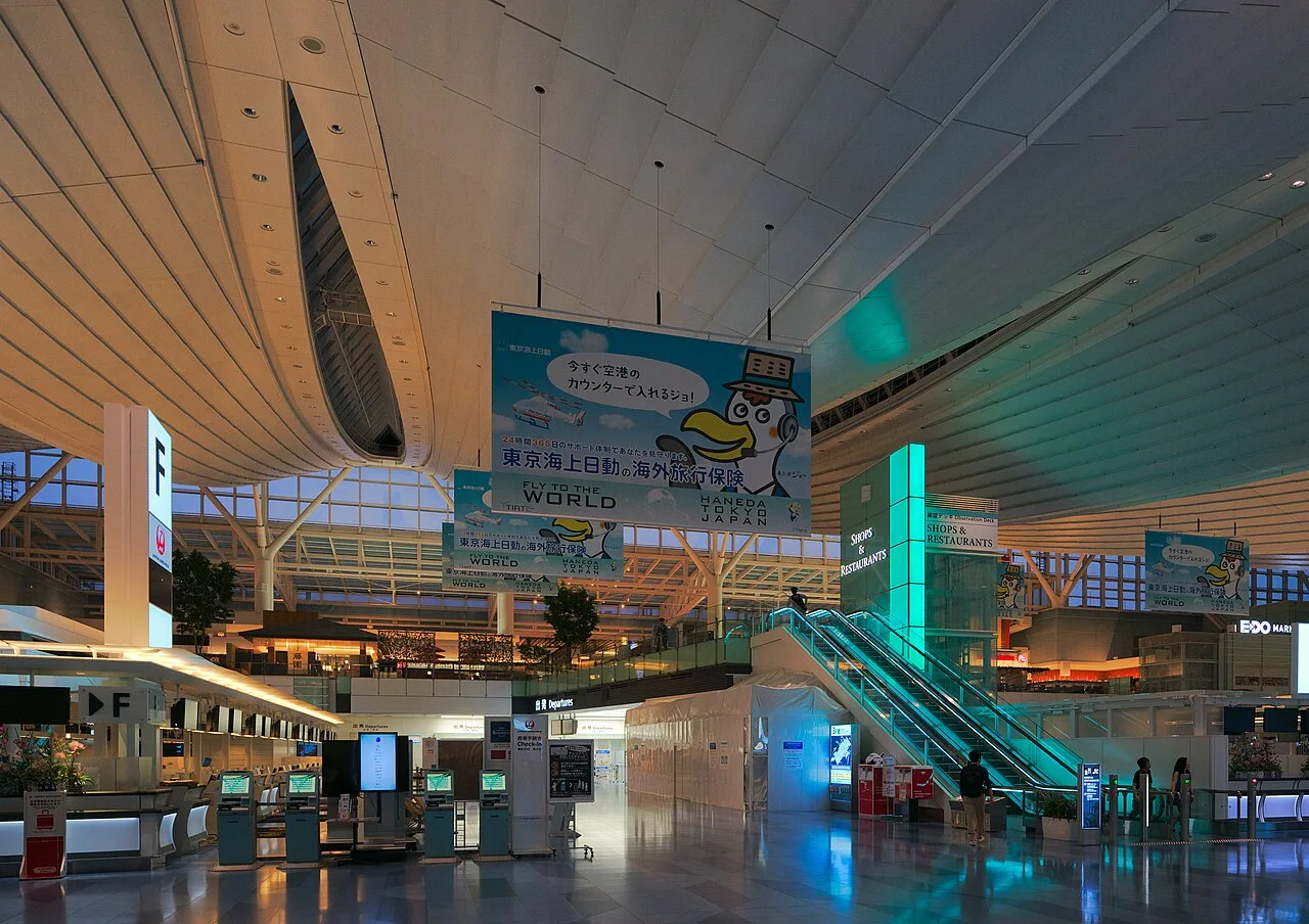 Departure lobby of Tokyo Haneda international terminal — Japan's primary business airport.