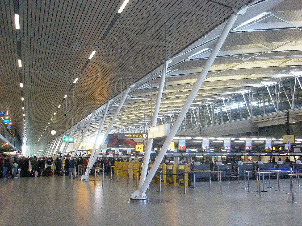 Departure hall at Amsterdam Schiphol Airport — single-terminal European hub.