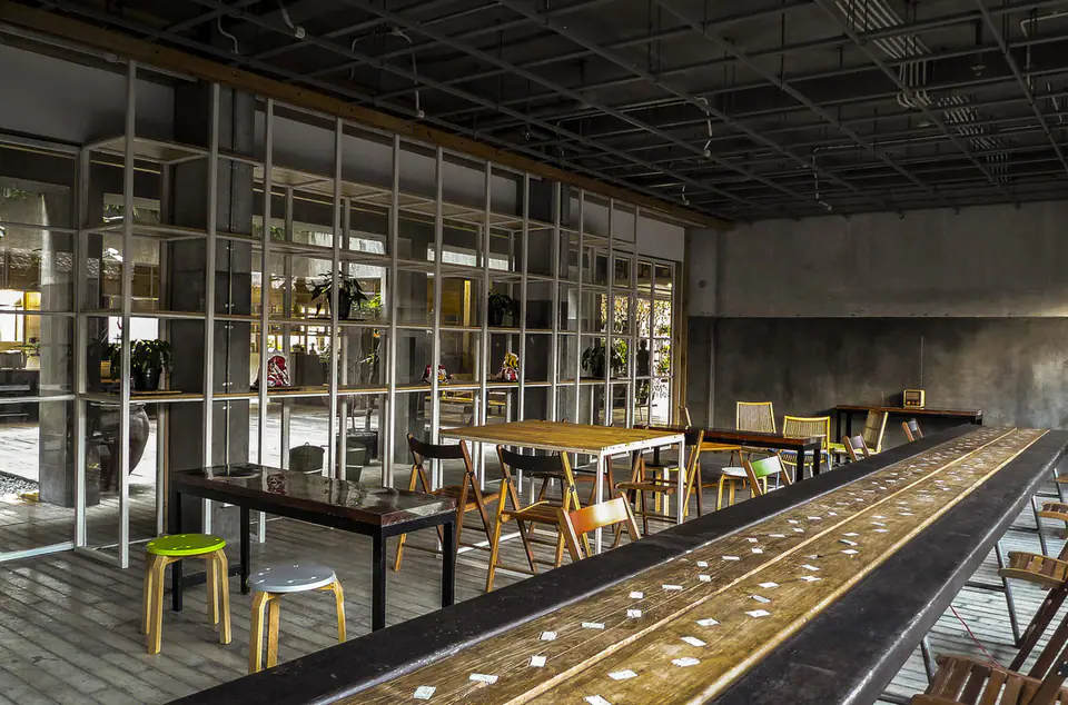 Industrial-style cafe and co-working space at Greenhost Boutique Hotel Prawirotaman