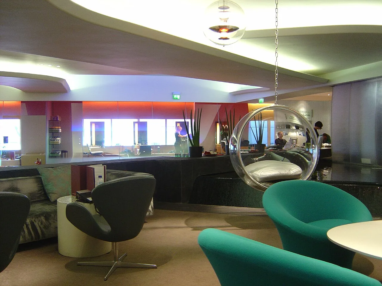 Virgin Atlantic Clubhouse style — JFK Terminal 4 transatlantic lounge.